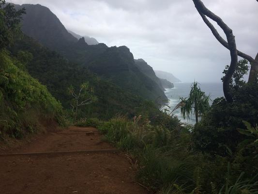 Kalalau Trail on the Na Pali coastline...rich colors, rugged shoreline and incredible views...high surf, severe mountains and beautiful skies... this is perhaps one of the most level and easy to hike portions of the trail. Just a very short portion of the trail that is in the first 2 miles of the trail. A beautiful adventure...