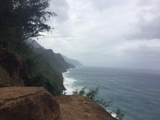 Kalalau Trail with rich colors of red soil , green trees and blue ocean and skies... a great hike.  The trail is 11 miles to Kalalau Valley with great nature and camping... it's a great place for adventures... especially with someone you love ❤