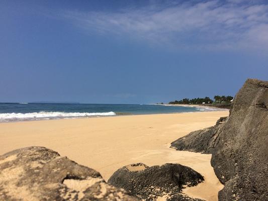 Waimea Beach in the little town of Waimea on Kauai... beautiful sand for walking and tanning. There is a pier for fishing or just looking at the water... a perfect place for watching sunsets... 