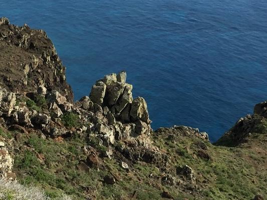 Rock formations on the cliffs with the beautiful blue Pacific Ocean 400 meters below... calm... peaceful... renewing... Niihau a such wonderful place.