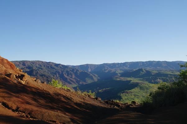 ❤️A photo from a spot on the drive up to Kokeè...the contrast between the colors is fantastic... clear, cloudless blue sky, vibrant greens and the ever present red dirt... 