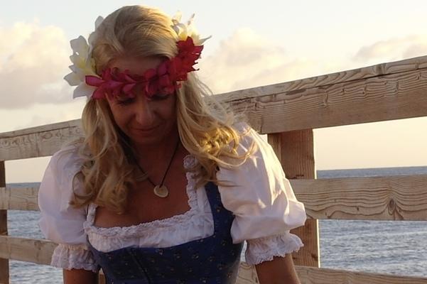 Lanz Dirndl traditional costume from Austria with plumeria haku lei 